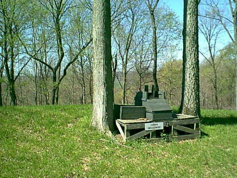 Reproduction Civil War cannon positioned behind an angle of Fort Duffield, representing how Union artillery crews aimed their 6‑pound smoothbore guns to cover the southern roads and backcountry approaches.