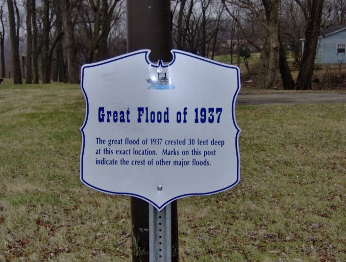 Floodwaters rising along the riverfront at West Point, showing how closely the town lives with the Ohio and Salt Rivers.