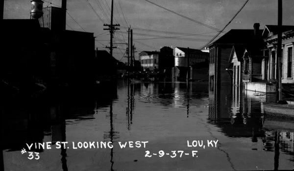 Historic 1937 photograph showing Vine Street in West Point, Kentucky underwater.
