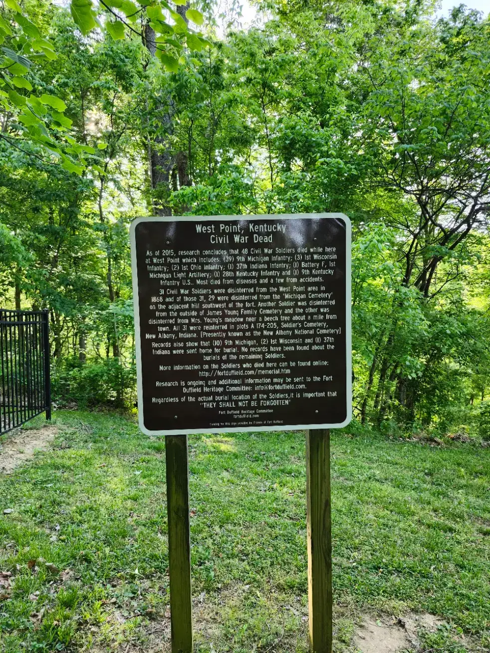 Interpretive sign showing burial layout and historical details